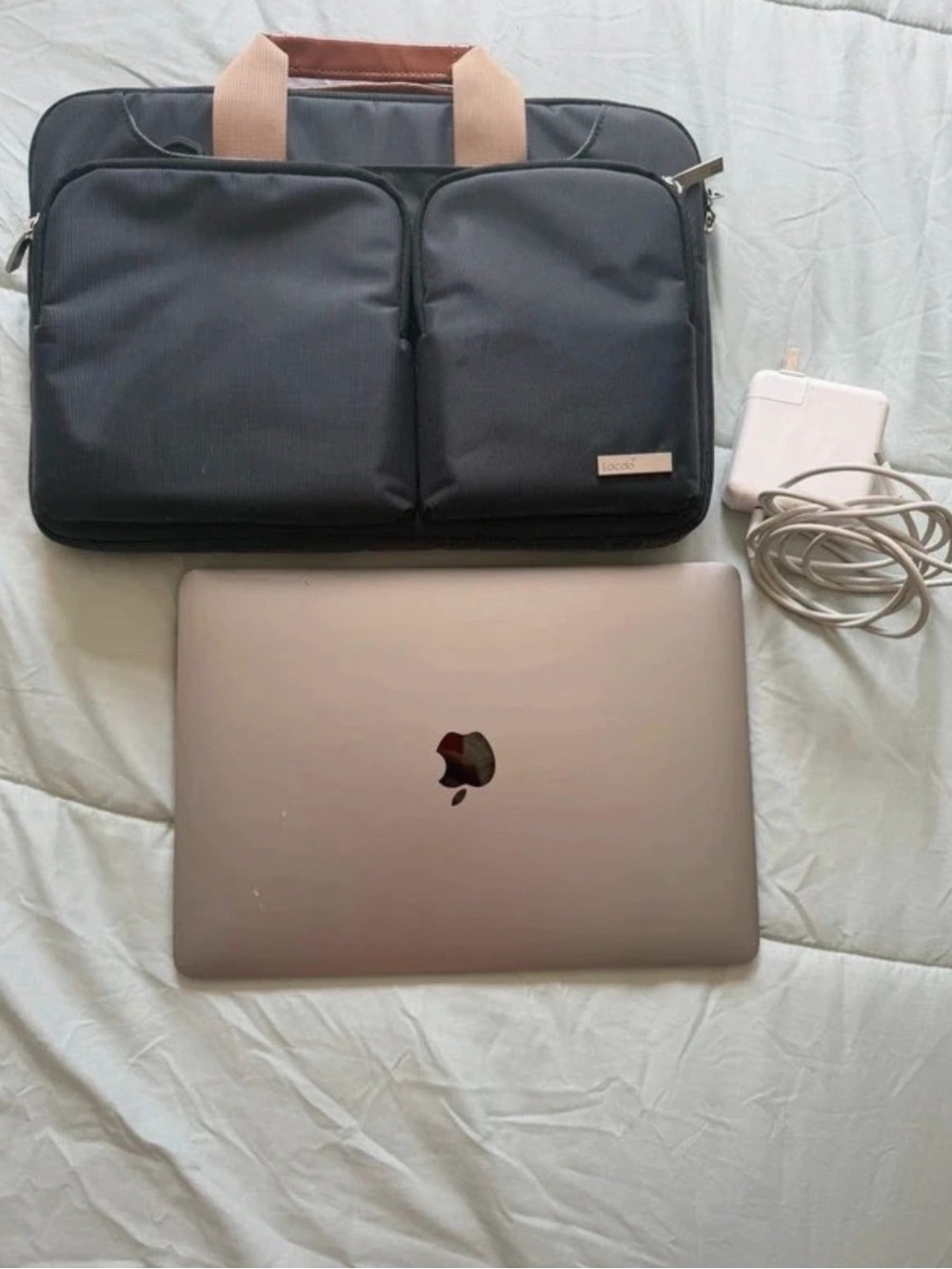 Apple MacBook Pro silver with Black Carry Sleeve and Charger